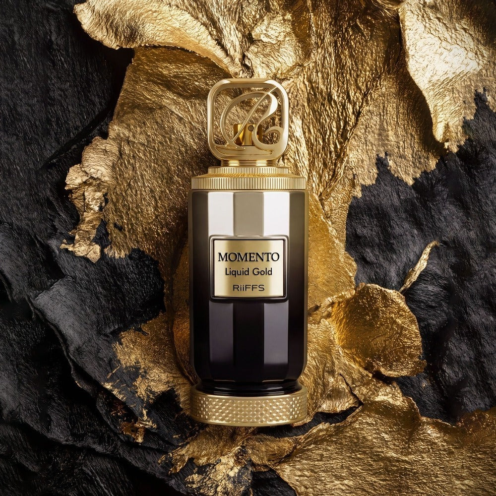 Riiffs Momento Liquid Gold perfume on gold textures