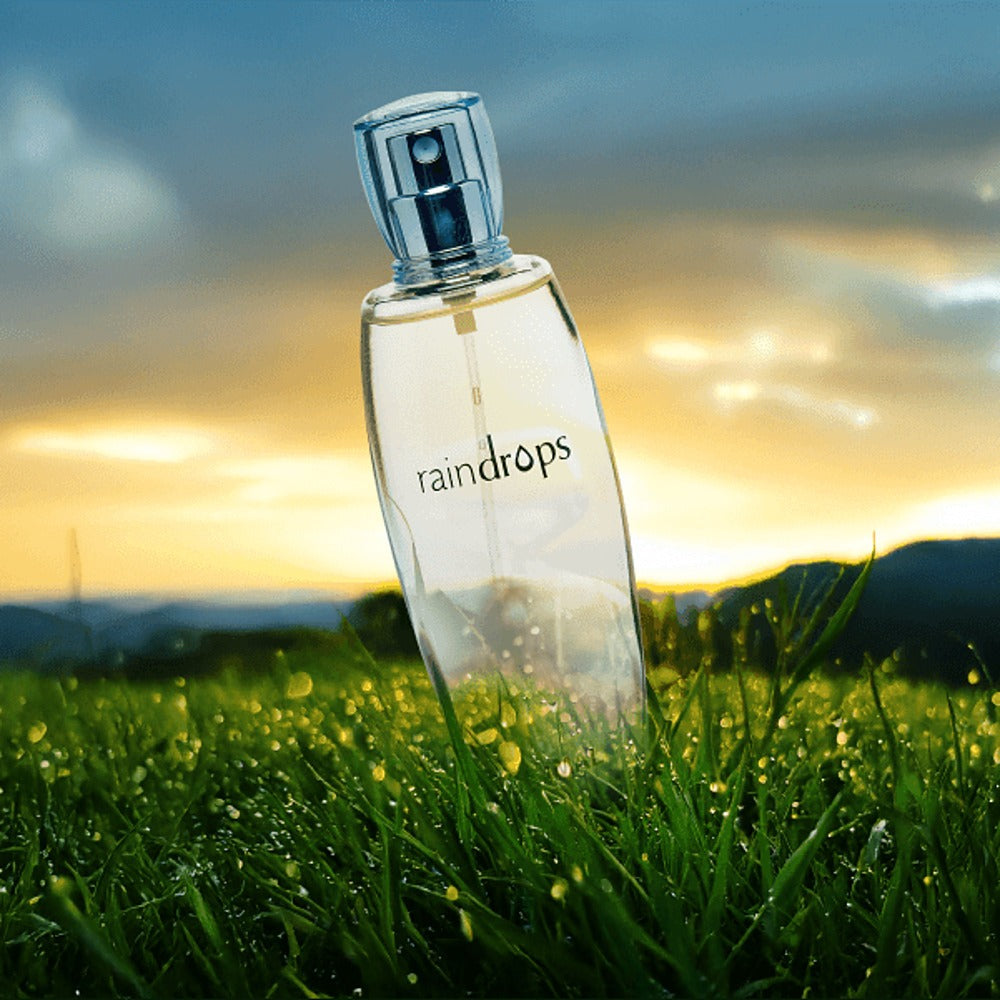 Ajmal Raindrops perfume in a meadow at sunset